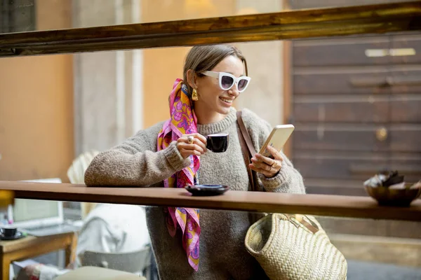 Woman drinking espresso coffee at traditional old style italian cafe — Stock Photo, Image