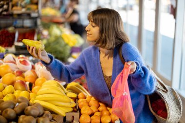 Woman shopping food at market