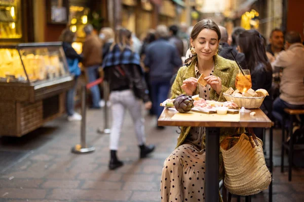 Woman with Italian snacks and drink at bar outdoors — Stock Photo, Image