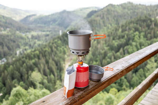 Preparing Food Hiking Special Dishware Portable Gas Burner Mountains Background Stock Photo