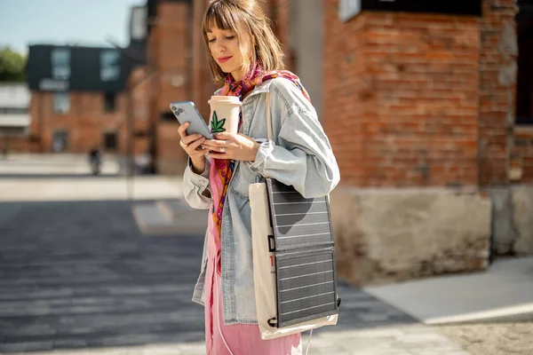 Young Stylish Woman Walks Coffee Smart Phone Charging Portable Solar — Foto de Stock