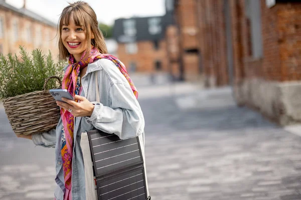 Young Stylish Woman Walks Green Plant Smart Phone Charging Portable — Photo