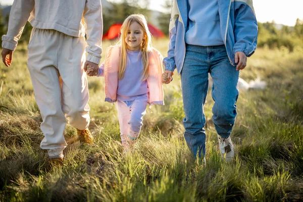 Portrait Cute Little Girl Walks Women Holding Hands Nature Sunset — Zdjęcie stockowe