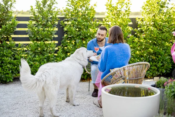 Young Stylish Man Woman Sit Relaxed Dog Have Dinner Beautiful — Stockfoto