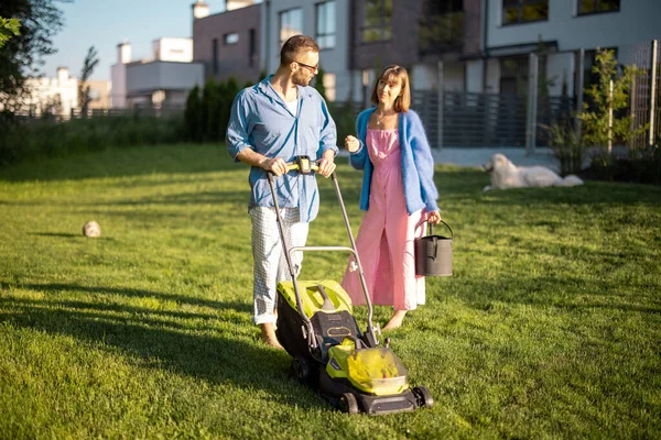 Man Mows Lawn Lawn Mower Spending Summer Time His Wife — Stock Photo, Image