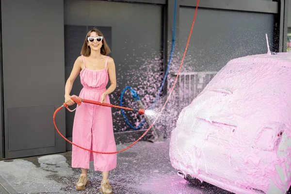 Young Woman Pink Dress Washing Her Tiny Car Nano Foam — Stockfoto