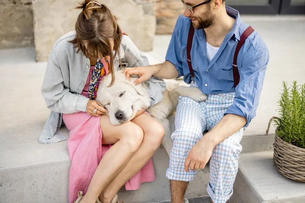 Young Stylish Couple Sit Together Have Fun White Dog Street — Photo
