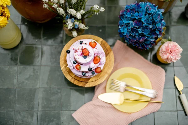 Beautiful Tiled Table Served Festive Berry Cheesecake Decorated Flowers View — Fotografia de Stock