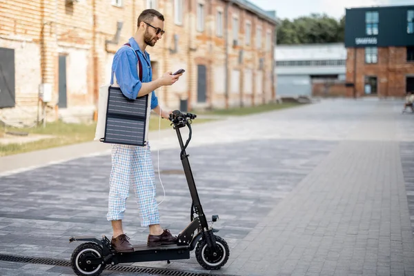Stylish Guy Drives Electric Scooter Charges Phone Solar Panel Move Stock Photo