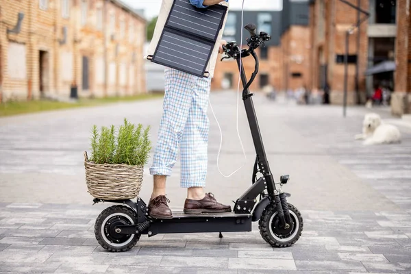 Guy Drives Electric Scooter Charges Phone Solar Panel Move Cropped Stock Picture