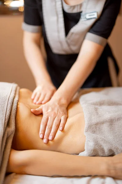 Masseuse Performs Professional Abdominal Massage Female Client Lying Couch Close —  Fotos de Stock