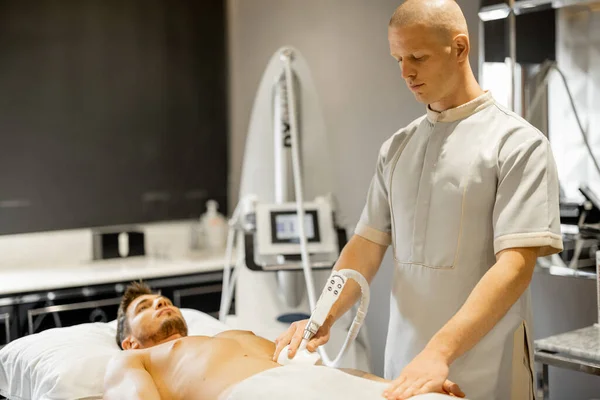 Employee Medical Center Applying Vacuum Roller Massage Clients Belly Area — Stok fotoğraf