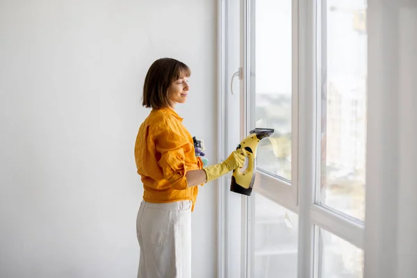 Young Housewife Cleaning Company Employee Washes Window Special Tool Apartment —  Fotos de Stock