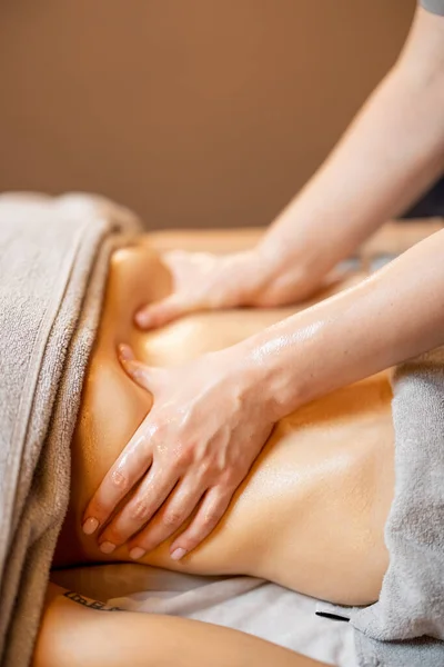 Masseuse Performs Professional Abdominal Massage Female Client Lying Couch Close —  Fotos de Stock