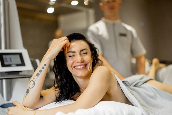 Portrait Happy Adult Woman Lying Medical Couch Vacuum Roller Massage —  Fotos de Stock
