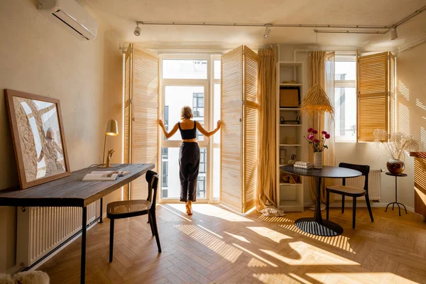 Woman Opens Window Blinds Letting Sun Room Spending Good Morning — Stok fotoğraf