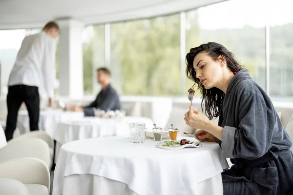 Beautiful Woman Bathrobe Enjoys Delicious Meal Sitting White Restaurant Haught —  Fotos de Stock