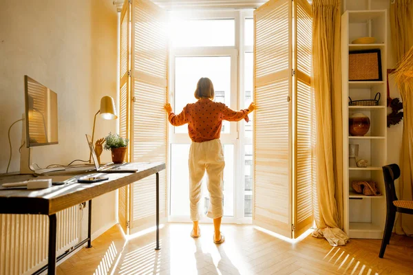 Woman Opens Window Blinds Letting Sun Room Spending Good Morning — Stok fotoğraf