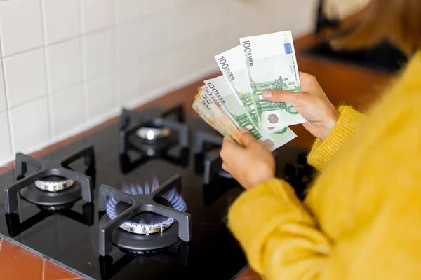 Person Countes Euro Banknotes Burning Gas Stove Home Concept Expensive — стоковое фото