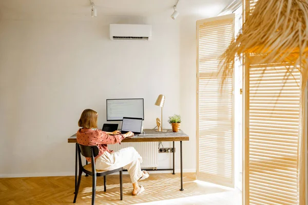 Woman Works Computers While Sitting Cozy Workplace Sunny Living Room — ストック写真