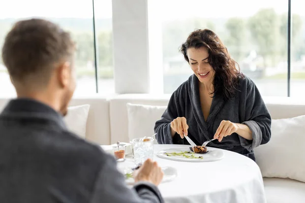 Couple Bathrobes Has Dinner Eating Beautiful Haute Cuisine Dishes Sitting — стоковое фото