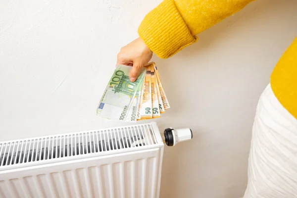 Person Holding Euro Banknotes Heater Home Concept Expensive Energy Resources — Stockfoto