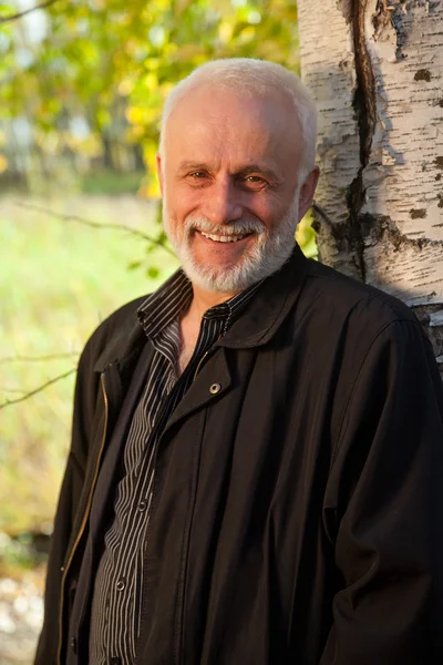 Mature man in forest — Stock Photo, Image