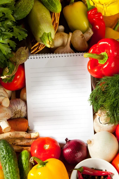 Notebook paper to write recipes and vegetables — Stock Photo, Image