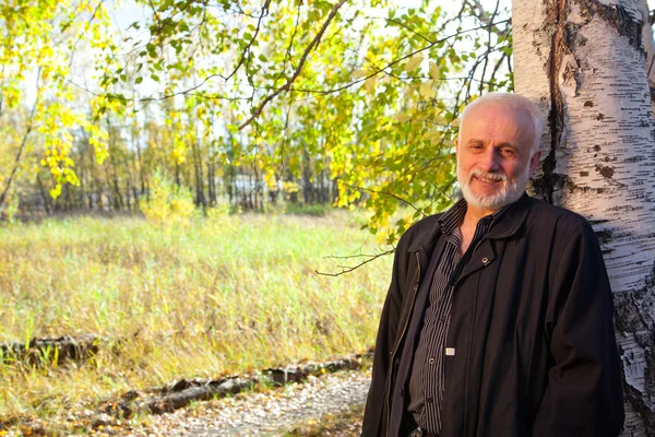 Mature man in forest — Stock Photo, Image