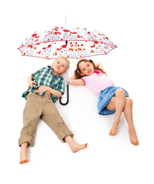 Children under an umbrella — Stock Photo, Image