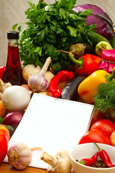 Notebook paper to write recipes and vegetables — Stock Photo, Image