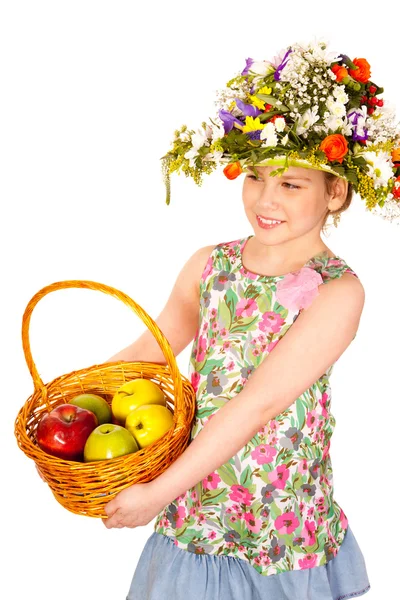 Eautiful meisje met bloemen en appels — Stockfoto