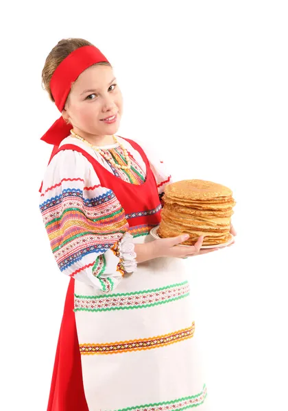 Meisje met stapel van pannenkoeken — Stockfoto