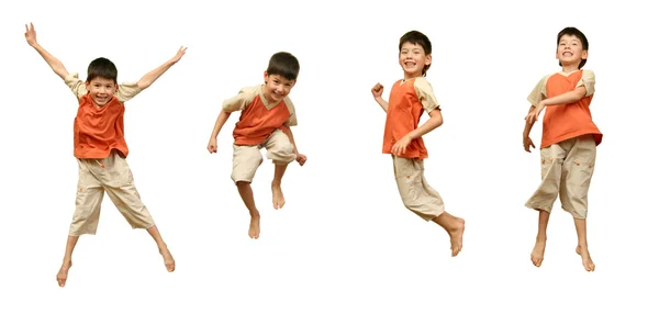 Jongen springt op witte achtergrond. — Stockfoto