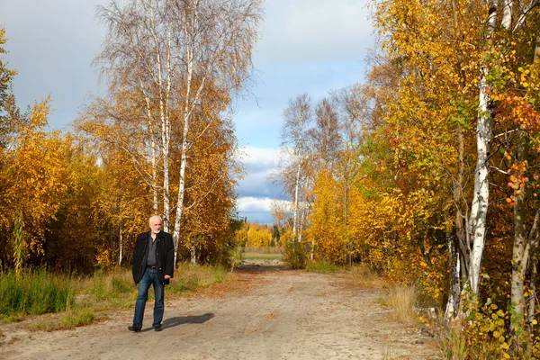 Mature man in forest — Stock Photo, Image