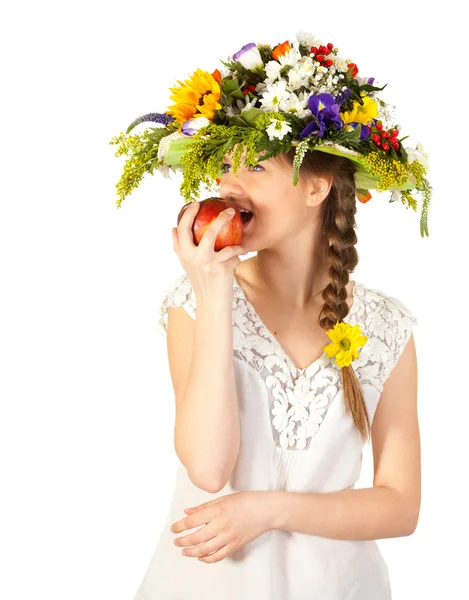 Krásná dívka s květinami a apple — Stock fotografie