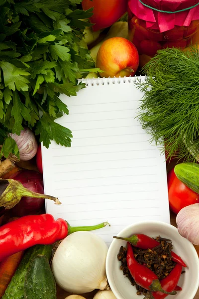 Notebook paper to write recipes and vegetables — Stock Photo, Image