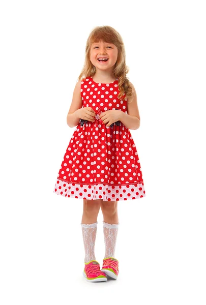 Cute smiling girl in red dress — Stock Photo, Image