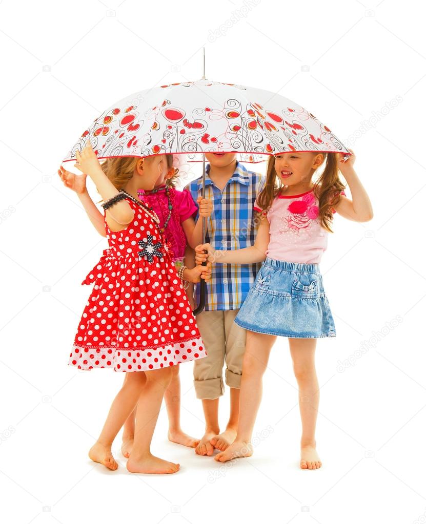 Barefoot children under an umbrella