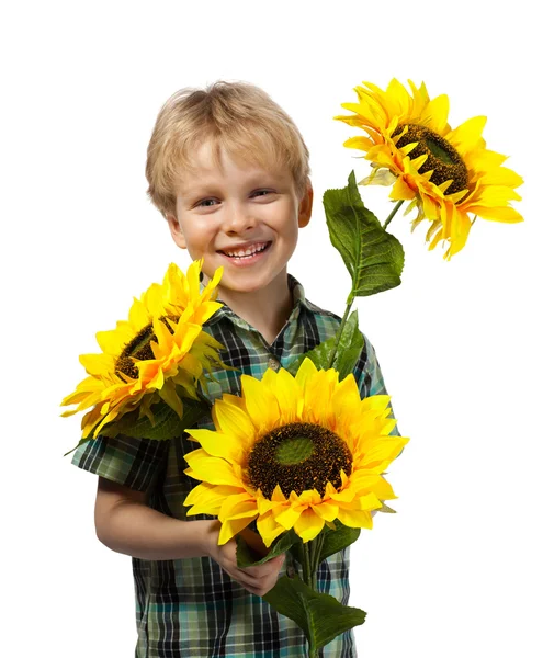 Happy boy with sunflowers — Stock Photo, Image