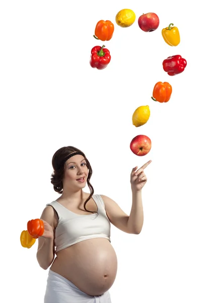Pregnant woman with vegetables and fruits — Stock Photo, Image