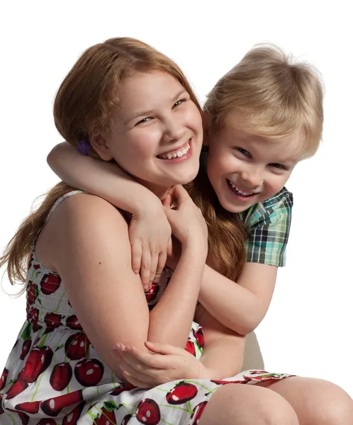 Little brother hugging sister — Stock Photo, Image