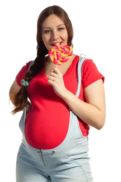 Zwangere vrouw en een lolly — Stockfoto