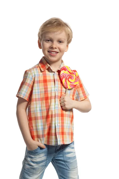 Kleine jongen met kleurrijke lolly — Stockfoto