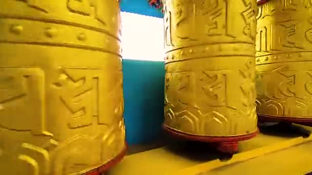 Buddhist Monastery Spinning Prayer Wheels Close Monastery Flat Angle — Stock Video