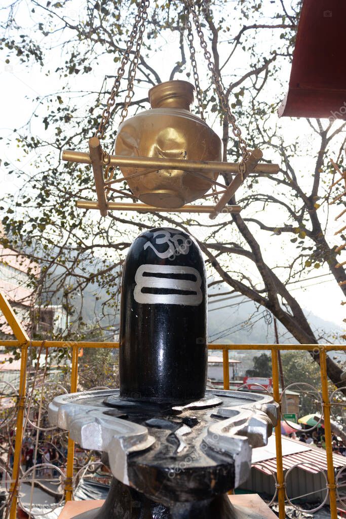hindu god lord Shiva linga with religious bells from different angle image is taken at haridwar uttrakhand india on Feb 23 22.