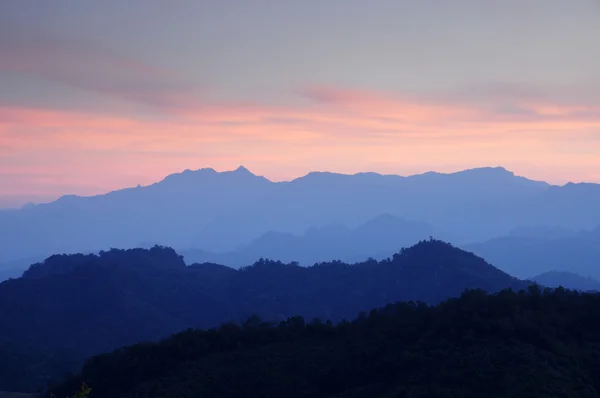 Sunsets over mountains — Stock Photo, Image