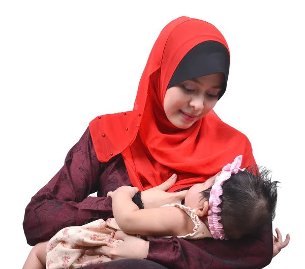 Young Asian muslim mother breastfeeding her cute baby girl isolated on white background — Stock Photo, Image