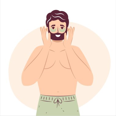 Skincare routine concept. Happy young man use apply under eye anti-wrinkle patches, handsome bearded male enjoying skincare procedure. Men hygiene