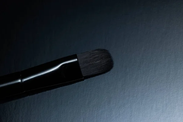 Close up photo of soft eyeshadow brush for make up. — Foto de Stock